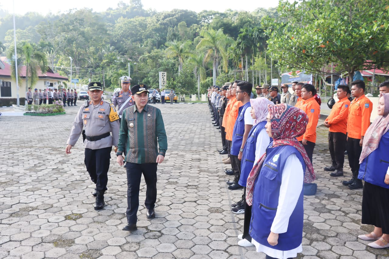 Pj. Walikota Sawahlunto Didampingi Kapolres Sawahlunto Pimpin Apel Gelar Ops Lilin 2024